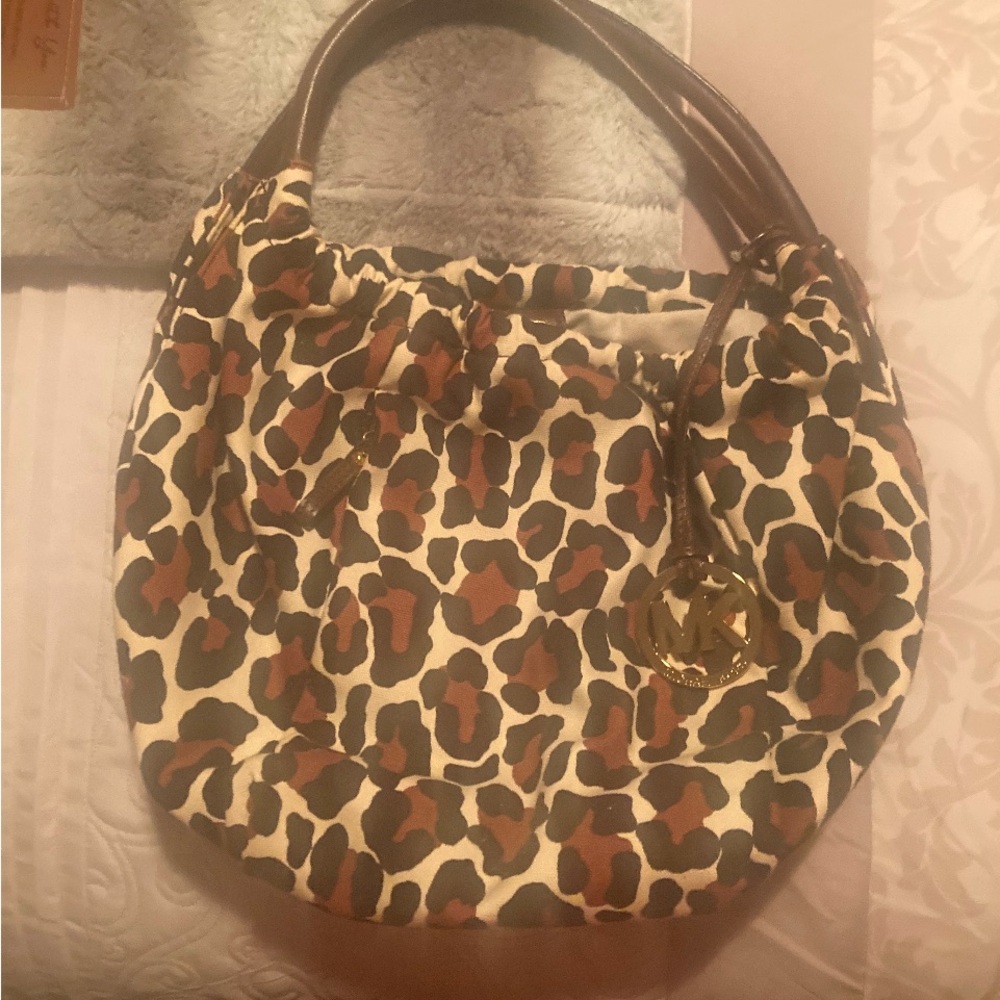 Michael Kors Brown Hobo Bag with Giraffe Print and Soft Texture